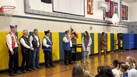 Mary Riggs accepts her award at a Twin Oaks Elementary School assembly, Sept. 30, 2026.