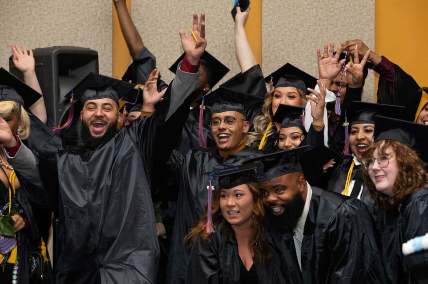 Milwaukee Area Technical College students celebrate their graduation in December 2019. The college hasn’t held an in-person graduation ceremony since the pandemic started. Like many U.S. colleges and universities, MATC saw a large drop in enrollment due to COVID-19.