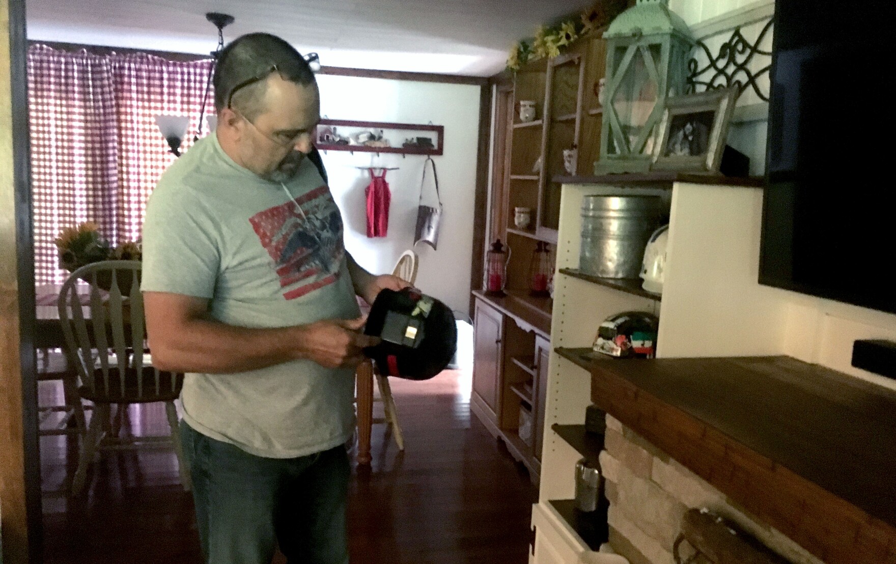 Barry Johnson wears an oxygen tube to assist breathing. 