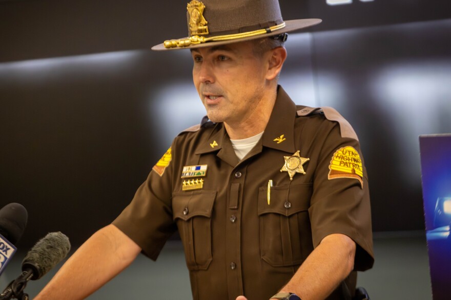 A Utah Highway Patrol sergeant speaks during a press conference about the safety of moving over for safety vehicles.