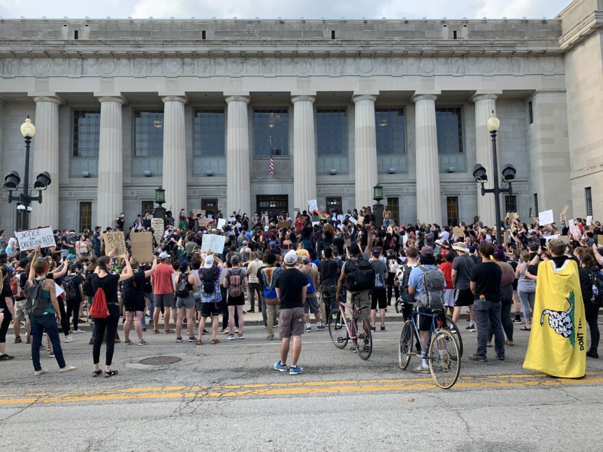Protesters gathered in front of Central Library Wednesday, June 3 before marching through Indianapolis to Monument Circle.