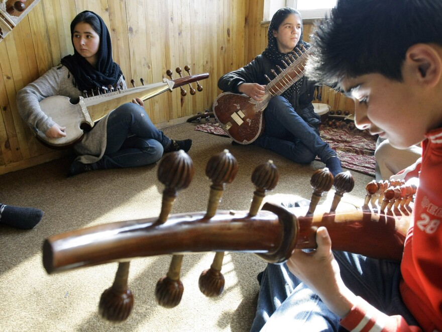 The Afghanistan National Institute of Music in Kabul trains both boys and girls. Here, students practice in January.