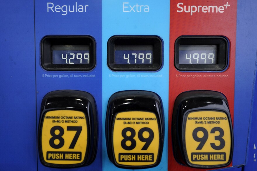 Gas prices appear on a pump at a gas station Monday, March 7, 2022, in Needham, Mass. The average price for a gallon of gasoline in the U.S. hits a record $4.17 on Tuesday as the country prepares to ban Russian oil imports. (AP Photo/Steven Senne)