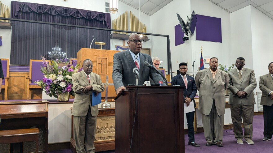 Bethel Missionary Baptist Church Pastor R.B. Holmes and other pastors make their appeal to members of the Tallahassee news media.