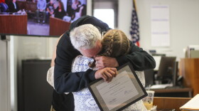 Michael Kincaid hugs Licking County Municipal Court H.O.M.E. Court Program Coordinator and Community Navigator Sherry Selfe after graduating from the court diversion program on Wednesday, Aug. 12, 2026.