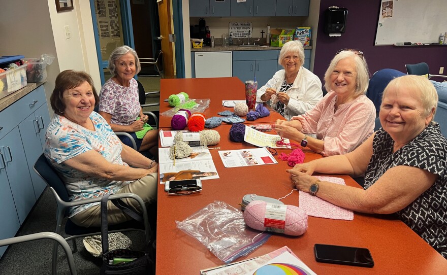 Moorings Presbyterian Church members meet to crochet.