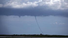 A waterspout touches down over Lake Okeechobee in Okeechobee, Florida.
