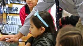 Kevin Kubacki is co-founder of EnLace Academy, a charter school off west 38th Street, that has seen early success with teaching Latino students English through a 'blended-learning' method that uses teachers and individual computer study.