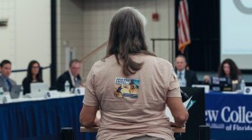 Woman speaking at a New College Board of Trustees meeting in 2023.