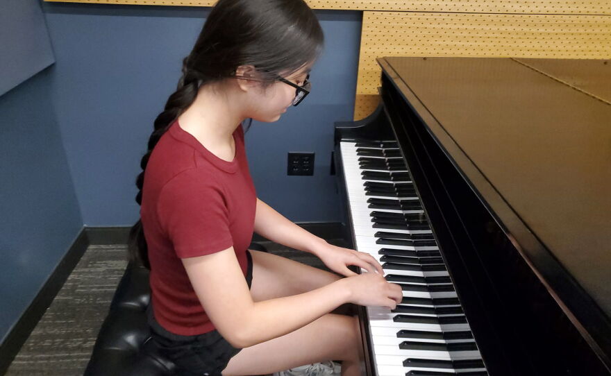 Michelle Liu, at the piano.