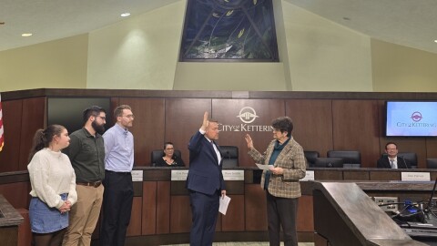 Bryan Suddith being sworn into office by former Kettering Mayor Peggy Lehner