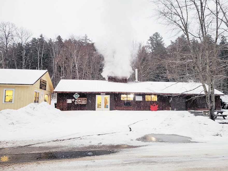 A plume of maple steam rises from Cornell University's Uihlein Maple Research Forest, near Lake Placid.