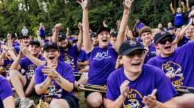 ECU Marching Pirates members cheer after finding out they will perform in the 101st Macy’s Thanksgiving Day Parade in 2027.