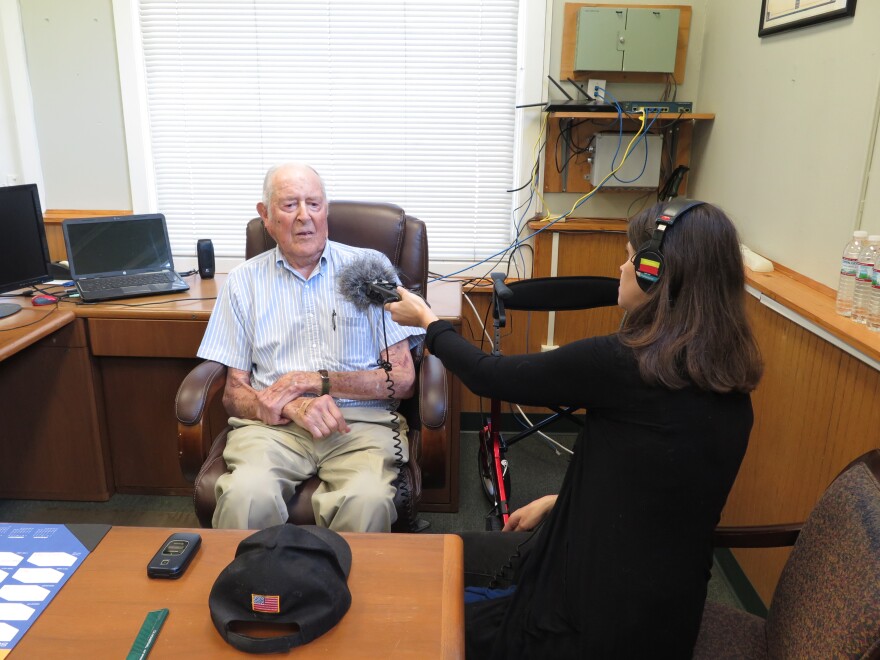 Charlie Jones being interviewed by Roxy Todd