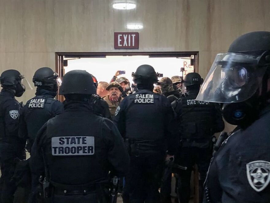 Oregon State Police declared on unlawful assembly at the State Capitol Monday as a group of far-right protesters led by Patriot Prayer attempted to gain access on Dec. 21, 2020.