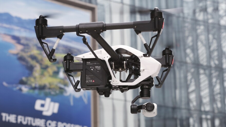 A DJI Technology drone flies during a demonstration in Shenzhen, China, in 2014. DJI sells the majority of Chinese-made drones bought in the United States.