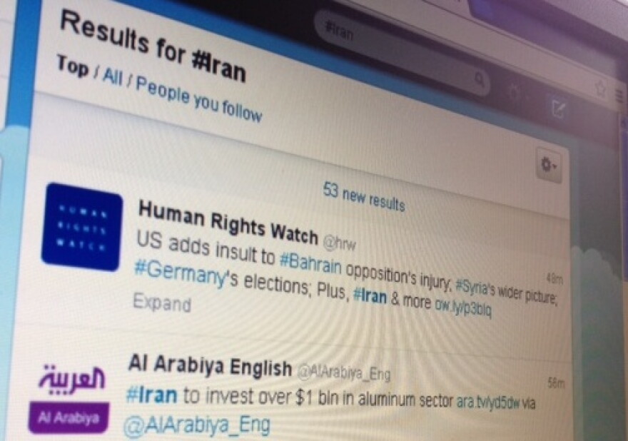 computer screen with Twitter search results for Iran