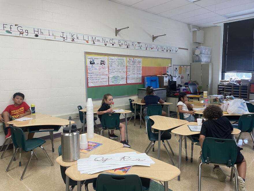 A metal bottle filled with cold water acts as a hydration station at the back of a classroom at Burbank Elementary in Milwaukee on a hot first day of school Sept. 1, 2026. The school does not have central air conditioning.