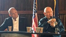 U.S. Agriculture Secretary Sonny Perdue, center, with Rep. Tom Reed, left, speaks to farmers at the Ravines Wine Cellars. TOM MAGNARELLI / WRVO PUBLIC MEDIA