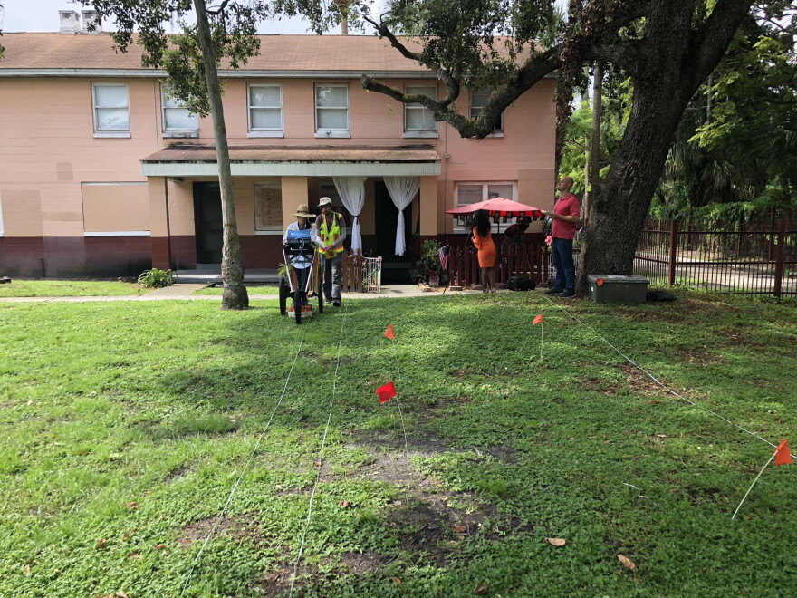 Rebecca O'Sullivan of the Florida Public Archaeology Network at USF and other researchers conduct ground penetrating scans at the Robles Park Village Housing Complex last year. COURTESY FLORIDA PUBLIC ARCHAEOLOGY NETWORK