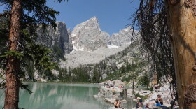Hikers soak in the views at Delta Lake in Wyoming’s Grand Teton National Park in late July 2026.