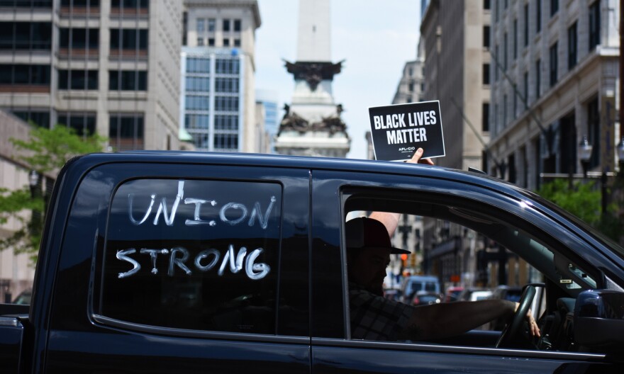 Union workers at a car rally outside the Indiana Statehouse.