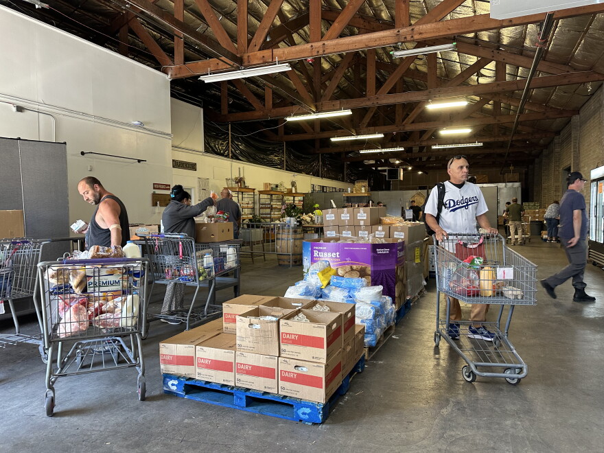 Locals “shopping” at Catholic Charities’ downtown location on Wednesday, Sept. 23.