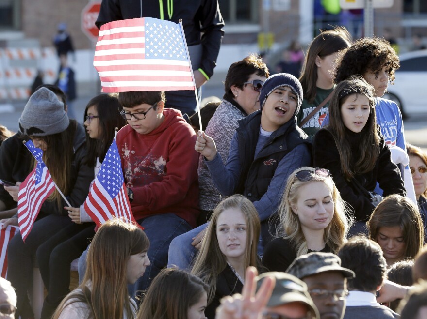 Young people attend a political rally before the recent Jefferson-Jackson dinner in Iowa. Energizing young voters may be a challenge for presidential candidates ahead of 2016.
