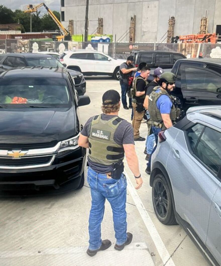 A Kansas City resident who believes he observed federal agents arresting Latino workers at a construction site in mid-July shared this photo with The Beacon. The workers were released shortly after this photo was taken.