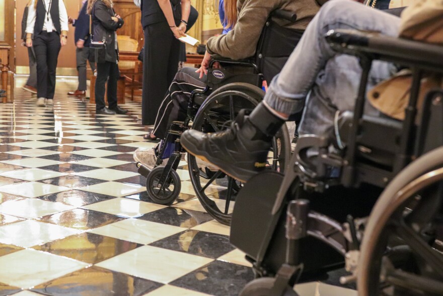 Catastrophically injured auto accident survivors at the state Capitol, asking legislators to fix no fault law that's depriving them of care