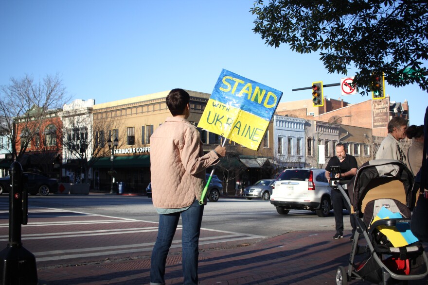 Community members gather on Feb. 28, 2022 for the "Stand with Ukraine" rally in downtown Athens.
