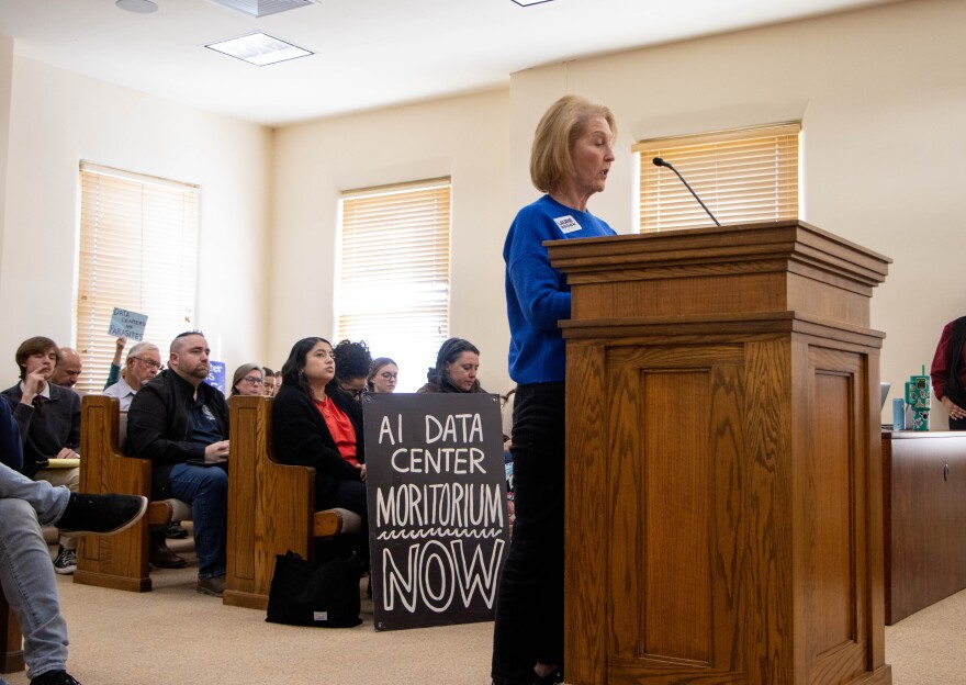 Hays County resident Laurie Brown speaks at a Hays County Commissioner's meeting in San Marcos. Brown spoke in opposition to the development of data centers in the area.
