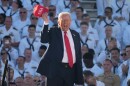 President Donald Trump arrives to speak during a celebration for the 250th anniversary of the U.S. Navy aboard the USS Harry S. Truman at Naval Station Norfolk, Sunday Oct. 5, 2025 in Norfolk, Va.