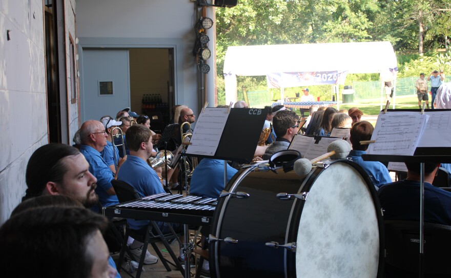 Attendees gather at the Connie Link Amphitheatre in Normal for a reading of the Declaration of Independence and concert marking America's 250th anniversary, July 8, 2026.