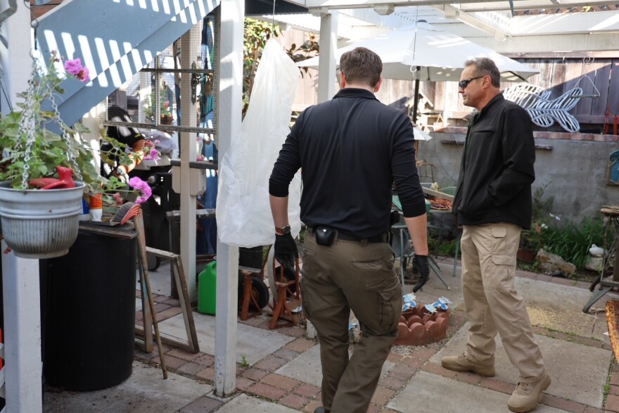 San Luis Obispo County Sheriff's detectives at the Arroyo Grande home of Susan Flores, the mother of convicted murder Paul Flores.