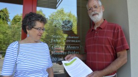 Pam and Toby Short with the letter they brought to State Sen. Jake Corman asking him to help pass redistricting reform.