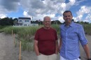 Dick Hill (left) and his son Clark Hill in front of their cottage at Popham Beach Estates.