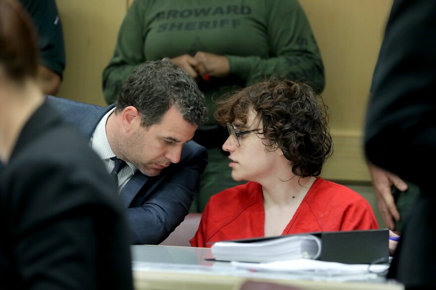 Parkland school shooting suspect Nikolas Cruz listens to proceedings with his attorney Gabriel Ermine at the Broward Courthouse in Fort Lauderdale, Fla., Friday November 1, 2019 during a hearing related to his case. 