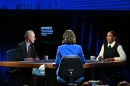 Republican nominee Don Tracy, left, moderator and “Chicago Tonight” anchor Brandis Friedman, center, and Democratic U.S. Senate nominee Juliana Stratton converse on set during the WTTW News U.S. Senate Candidate Forum on Tuesday at the Renée Crown Public Media Center in Chicago