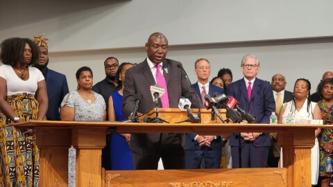  A picture of the surviving members of the victims of the Tops 5/14 shooting and attorney Benjamin Crump within the Elim Christian Fellowship church.