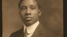 Formal portrait photo of R. Nathaniel Dett, wearing a suit