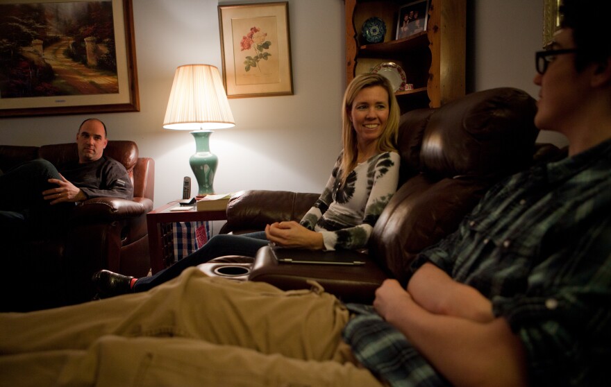 David and Sue Jordan talk to their son, David, 13. Making sure their children can still hold a conversation with adults and maintain eye contact is highly valued.