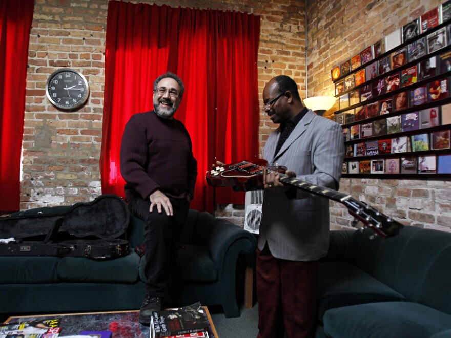 Produce Bruce Iglauer (left), founder of Alligator Records, works with blues artist Lil' Ed William at Joyride Studios in Chicago.