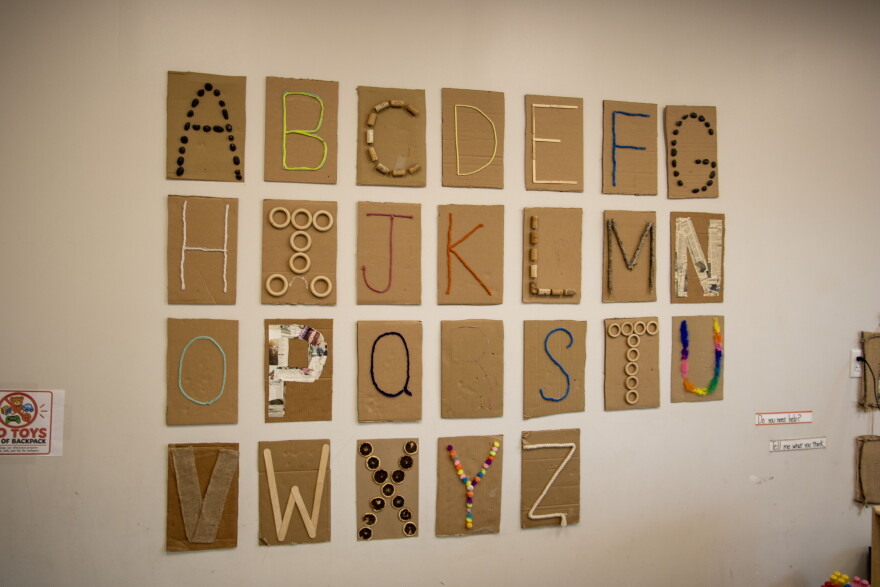 An alphabet wall is shown at Imagination Child Development Center, which partners with Pre-K 4 SA.