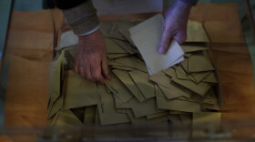 Ballots are counted by an election official for the 2017 presidential election at a polling station in Paris, The election was seen as a test for the spread of populism around the world. (Emilio Morenatti/AP)