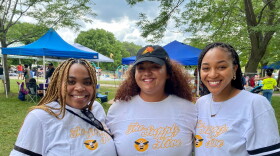 Aaliyah Quinn and Zakariyah Hill, co-founders of The Supply Hive, and Emani DuBoise, who is on the nonprofit's board of directors, pose for a picture at their Celebration of Black Motherhood event in Des Moines Sunday.