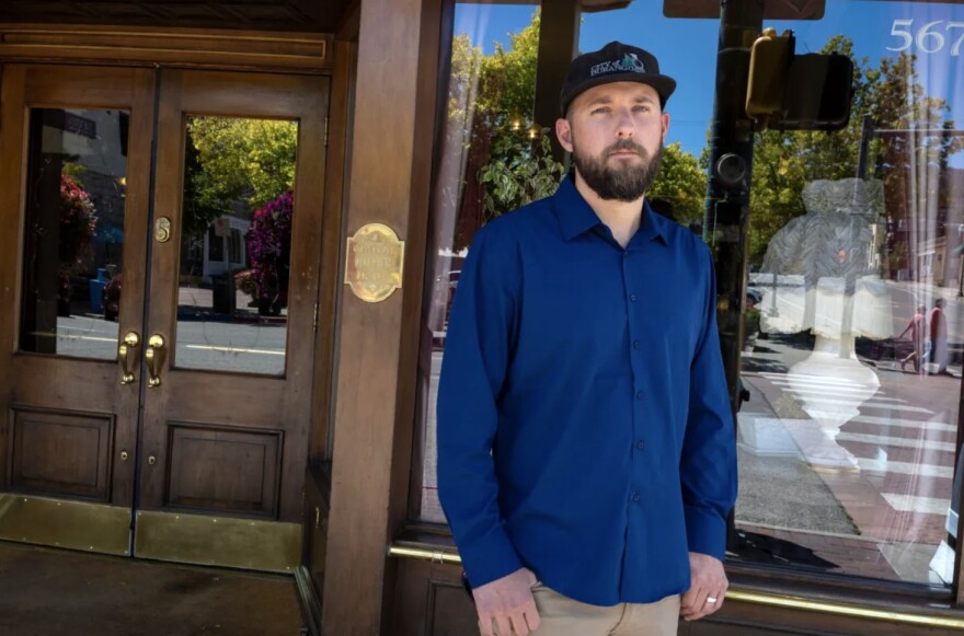 Devin King, multimodal manager for the City of Durango’s transportation department, stands next to the notorious intersection of College Drive and Main Street, Sept. 4, 2024, in Durango. King is working to improve the intersection and other locations with a history of pedestrian and car conflict.