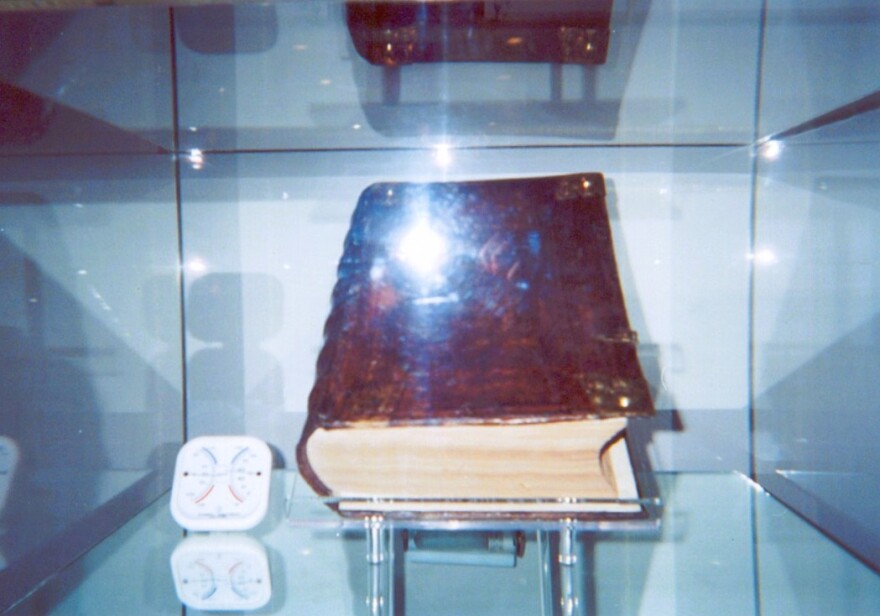 The glass case at the Boerne Public Library where the Bible was held.