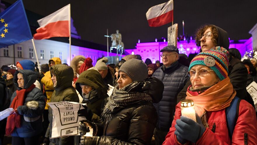 People protest in front of the presidential palace in Warsaw, Poland, earlier this month against controversial moves by the right-wing government that the EU insists undermine the rule of law and separation of powers.