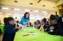 ECOS President Kelly Vlahakis-Hanks instructs Fifth Ward Elementary School students as they make their own room sprays to take home during a workshop on Tuesday, May 14, 2024.